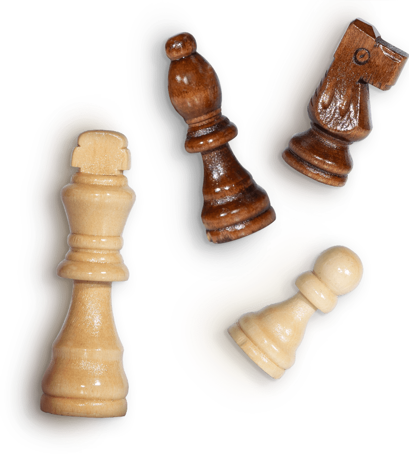 Four chess pieces laying down